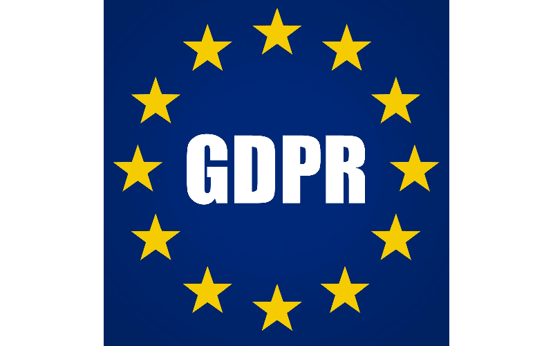 scritta GDPR circondata da stelle su sfondo blu